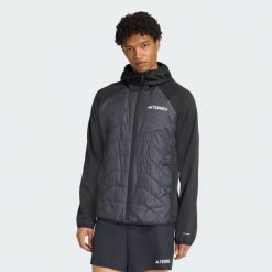 Ocieplana hybrydowa kurtka z kapturem Terrex Multi CLIMAWARM. Czarne kurtki męskie ADIDAS, m, bez wzorów, sportowe, bez ramiączek, z kapturem. Za 529.00 zł.