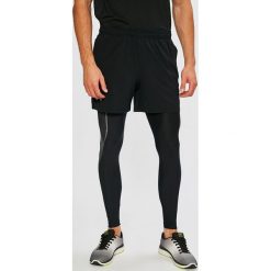 Under Armour - Szorty. Szare szorty sportowe męskie Under Armour, z materiału, sportowe. W wyprzedaży za 139.90 zł.