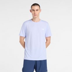 Koszulka męska New Balance MT51801DYK – niebieska. Niebieskie t-shirty sportowe męskie New Balance, m, bez wzorów, z materiału, sportowe, bez ramiączek. Za 129.99 zł.