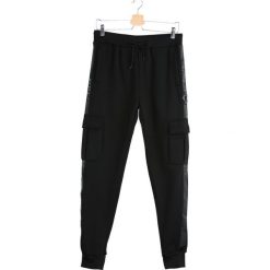 Czarne Spodnie Dresowe Long Suffering. Spodnie dresowe męskie marki Born2be. Za 39.99 zł.