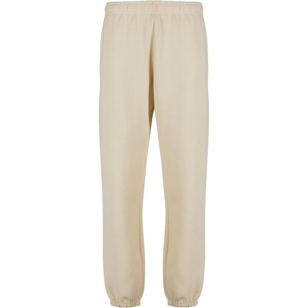 Podstawowe spodnie dresowe Urban Classics. Białe spodnie dresowe męskie Urban Classics, bez wzorów, z dresówki, długie. Za 124.00 zł.