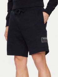 Tommy Hilfiger Szorty sportowe Flag Logo Badge MW0MW36145 Granatowy Regular Fit. Niebieskie szorty sportowe męskie Tommy Hilfiger, bez wzorów, z bawełny, sportowe. Za 239.99 zł.