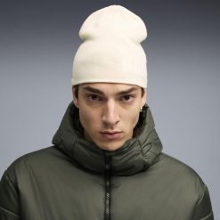 Czapka beanie średniej głębokości Essentials bez mankietu PUMA Alpine Snow White. Białe czapki męskie Puma, bez wzorów, eleganckie. Za 79.00 zł.