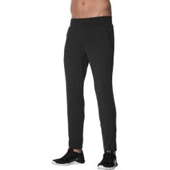 Asics Spodnie męskie Knit Train czarne r. L (1410820934). Długie spodnie sportowe męskie marki Asics. Za 138.10 zł.
