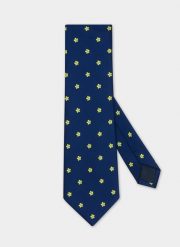 Granatowy krawat męski w żółte kwiatki P22SF-KX-018-G-0. Niebieskie krawaty i muchy męskie Pako Lorente, bez wzorów, z poliesteru. Za 9.99 zł.