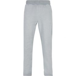 Spodnie dresowe z grubymi rozcięciami z frotte Urban Classics. Niebieskie spodnie dresowe męskie Urban Classics, bez wzorów, z dresówki. Za 267.50 zł.