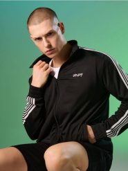 Bluza bomberka z lampasami - czarny. Czarne kurtki męskie Sinsay, l, bez wzorów, bez ramiączek, bez kaptura. Za 59.99 zł.