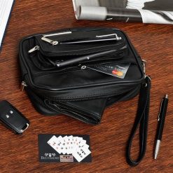 Czarna Saszetka męska skórzana do ręki na dokumenty Beltimore G25. Czarne saszetki męskie Beltimore, bez wzorów. Za 99.90 zł.