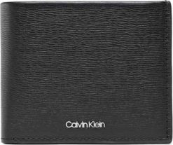 Calvin Klein Portfel marki Calvin Klein model K50K509989 kolor Czarny. Akcesoria Męskie. Sezon: Jesień/Zima NoSize. Czarne portfele męskie Calvin Klein, bez wzorów. Za 204.80 zł.