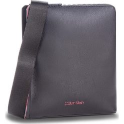 Saszetka CALVIN KLEIN - Double Edge Flat Cro K50K503923 910. Saszetki męskie marki Calvin Klein. W wyprzedaży za 269.00 zł.