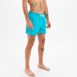 Spodenki surfingowe męskie Olaian Hendaia NT. Niebieskie szorty męskie OLAIAN, bez wzorów, z materiału, sportowe. Za 19.99 zł.