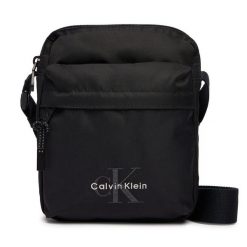 Saszetka Calvin Klein. Czarne saszetki męskie Calvin Klein, bez wzorów, małe. Za 289.99 zł.