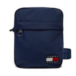 Saszetka Tommy Jeans. Niebieskie saszetki męskie Tommy Jeans, bez wzorów, z jeansu, małe. Za 159.99 zł.