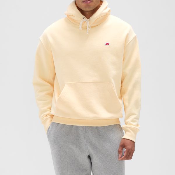 Bluza męska New Balance MADE in USA MT43546CAU – żółta. Żółte bluzy nierozpinane męskie New Balance, l, bez wzorów, z bawełny, klasyczne, bez ramiączek, z kapturem. Za 829.99 zł.