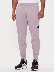 Adidas Spodnie dresowe Z.N.E. Winterized IR5245 Fioletowy Regular Fit. Fioletowe spodnie dresowe męskie ADIDAS, bez wzorów, z dresówki. Za 379.99 zł.