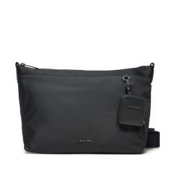 Saszetka Calvin Klein. Czarne saszetki męskie Calvin Klein, bez wzorów, małe. Za 249.99 zł.