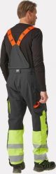 Helly Hansen Winter overalls HELLY HANSEN Alna 2.0, black/yellow C58. Czarne długie spodnie sportowe męskie Helly Hansen, bez wzorów. Za 650.40 zł.