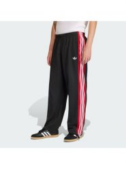 Adidas Spodnie dresowe KE0117 Czarny Loose Fit. Czarne spodnie dresowe męskie ADIDAS, bez wzorów, z dresówki. Za 348.99 zł.
