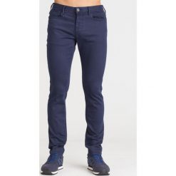 GRANATOWE JEANSY EMPORIO ARMANI. Niebieskie jeansy męskie Emporio Armani, z aplikacjami, z jeansu. Za 364.50 zł.