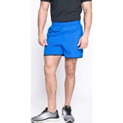 Under Armour - Szorty. Niebieskie szorty sportowe męskie Under Armour, z aplikacjami, z materiału, sportowe. W wyprzedaży za 89.90 zł.