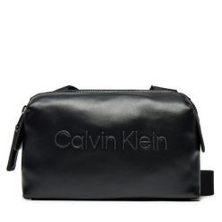 Saszetka Calvin Klein. Czarne saszetki męskie Calvin Klein, bez wzorów, młodzieżowe, małe. Za 199.99 zł.
