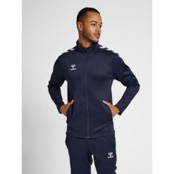 Bluza sportowa dla dorosłych Hummel Core XK Poly Zip Sweat. Niebieskie bluzy nierozpinane męskie HUMMEL, xl, bez wzorów, sportowe, bez ramiączek, bez kaptura. Za 212.50 zł.