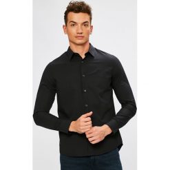 Calvin Klein Jeans - Koszula. Czarne koszule męskie Calvin Klein Jeans, l, bez wzorów, z bawełny, bez kołnierzyka, bez ramiączek. W wyprzedaży za 239.90 zł.