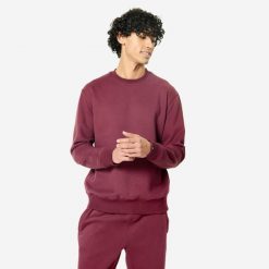 Bluza męska Domyos Gym & Pilates. Fioletowe bluzy nierozpinane męskie DOMYOS, m, bez wzorów, z bawełny, sportowe, bez ramiączek, bez kaptura. Za 69.99 zł.