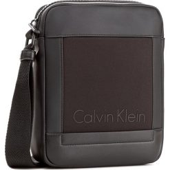 Saszetka CALVIN KLEIN - Caillou Repotrer K50K502885 001. Saszetki męskie marki Calvin Klein. W wyprzedaży za 239.00 zł.