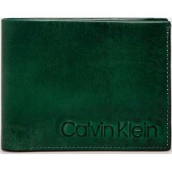 Calvin Klein - Portfel skórzany. Brązowe portfele męskie Calvin Klein, bez wzorów, z materiału. W wyprzedaży za 199.90 zł.