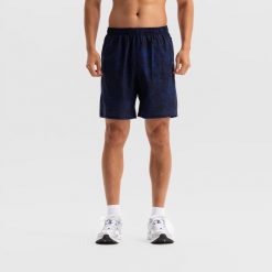Spodenki fitness cardio męskie Domyos. Niebieskie szorty sportowe męskie DOMYOS, bez wzorów, z elastanu, sportowe. Za 49.99 zł.