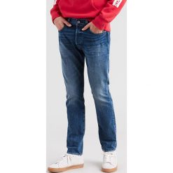 Dżinsy "501" - Skinny fit - w kolorze niebieskim. Niebieskie jeansy męskie Denim Special, z aplikacjami, klasyczne. W wyprzedaży za 265.95 zł.