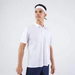 Koszulka polo do tenisa męska Artengo Essential. Białe koszulki polo męskie KUIKMA, m, bez wzorów, z materiału, klasyczne, bez kołnierzyka, bez ramiączek. Za 29.99 zł.
