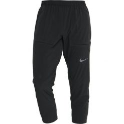 Nike Performance RUNNING PANTS RUN DIVISION Spodnie treningowe black/black. Długie spodnie sportowe męskie Nike Performance. Za 399.00 zł.