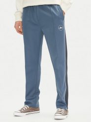 Converse Spodnie dresowe Retro Track 10027328-A01 Niebieski Regular Fit. Niebieskie spodnie dresowe męskie Converse, bez wzorów, z dresówki. Za 199.99 zł.