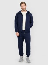 4F Spodnie dresowe joggery męskie - granatowe M. Niebieskie długie spodnie sportowe męskie 4f, bez wzorów, z dresówki, na fitness i siłownię. Za 159.99 zł.