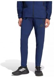 Adidas teamswear Spodnie męskie adidas Tiro 26 Travel Woven granatowe KE8364 XL. Długie spodnie sportowe męskie Adidas teamswear, bez wzorów. Za 278.99 zł.