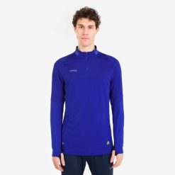 Bluza piłkarska Kipsta CLR półsuwak. Niebieskie bluzy nierozpinane męskie KIPSTA, l, bez wzorów, z materiału, sportowe, bez ramiączek, bez kaptura. Za 129.99 zł.