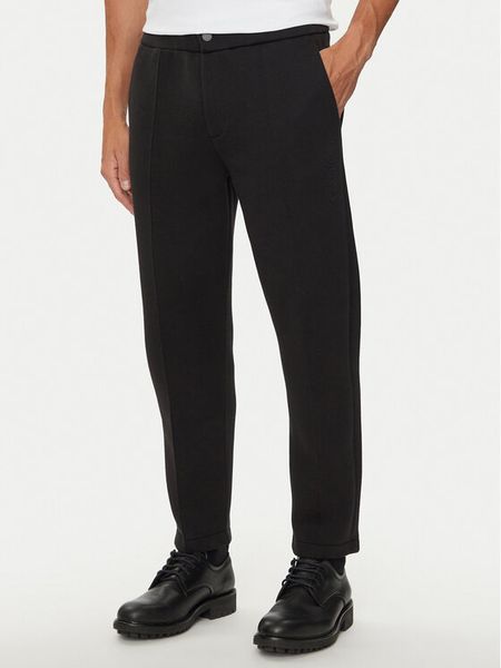 Calvin Klein Spodnie materiałowe K10K113661 Czarny Regular Fit. Czarne spodnie na co dzień męskie Calvin Klein, bez wzorów, z bawełny. Za 279.99 zł.