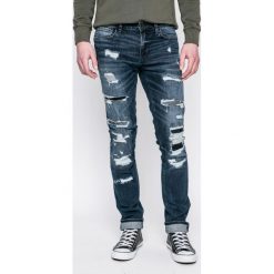 Guess Jeans - Jeansy. Niebieskie jeansy męskie Guess Jeans, z bawełny. W wyprzedaży za 269.90 zł.
