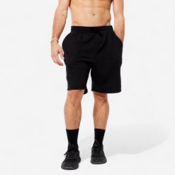 Spodenki fitness męskie Domyos. Czarne szorty sportowe męskie DOMYOS, bez wzorów, z włókna, sportowe. Za 69.99 zł.