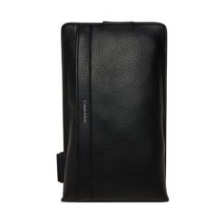 Saszetka Calvin Klein. Czarne saszetki męskie Calvin Klein, bez wzorów, młodzieżowe, małe. Za 209.99 zł.