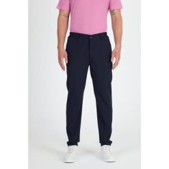 Spodnie Chino Męskie Merino - Smart & Flex. Niebieskie eleganckie spodnie męskie WOOLONA, bez wzorów, sportowe. W wyprzedaży za 432.00 zł.