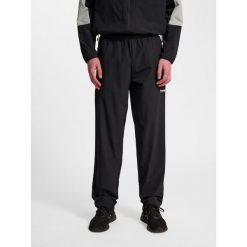 Spodnie do biegania Hummel Pulse. Czarne buty do biegania męskie HUMMEL, bez wzorów, z dresówki, bez zapięcia, do biegania. Za 267.00 zł.