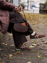 Saszetka - brązowy. Brązowe saszetki męskie Sinsay, bez wzorów. Za 19.99 zł.