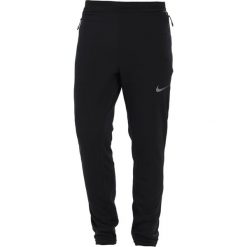 Nike Performance Spodnie treningowe black/midnight fog/metallic hematite. Długie spodnie sportowe męskie marki Nike Performance. W wyprzedaży za 375.20 zł.