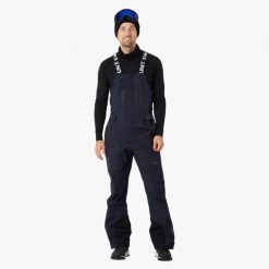 Spodnie narciarskie męskie Swedemount Lofoten 3L Shell Bib Pants II wodoodporne. Niebieskie spodnie narciarskie i snowboardowe męskie SWEDEMOUNT, bez wzorów, narciarskie. W wyprzedaży za 672.00 zł.