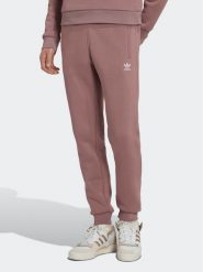 Adidas Spodnie dresowe adicolor Essentials Trefoil HK0105 Różowy Slim Fit. Czerwone spodnie dresowe męskie ADIDAS, bez wzorów, z bawełny. Za 249.99 zł.