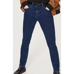 Klasyczne jeansy slim fit - Niebieski. Niebieskie sztyblety męskie marki Reserved, z jeansu, klasyczne. W wyprzedaży za 59.99 zł.