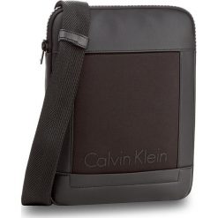 Saszetka CALVIN KLEIN - Caillou Flat Crosso K50K502835 001. Saszetki męskie marki Calvin Klein. W wyprzedaży za 209.00 zł.